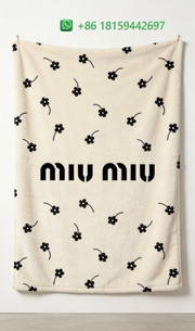 Miumiu Throw Blankets